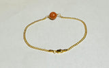 10 Karat Yellow Gold Curb Link Bracelet with 9mm Brown Goldstone Venturina Bead