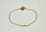 10 Karat Yellow Gold Curb Link Bracelet with 9mm Brown Goldstone Venturina Bead