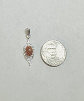 Sterling Silver and 8 x 6mm Oval Brown Goldstone "Venturina" Leaf Motif Pendant with 18" Chain