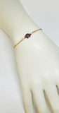 10 Karat Yellow Gold Genuine 6mm Azabache Jet and Coral Bead Curb Link Bracelet