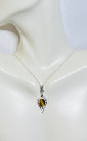 Sterling Silver and Genuine 8 x 6mm Oval Cabochon Tiger's Eye Leaf Motif Pendant with 18" Chain