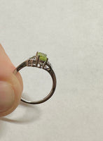 Sterling Silver Rhodium-plated Genuine Oval 6mm x 4mm Peridot Ladies Ring with Hearts