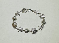 Sterling Silver Seashell, Sand Dollar and Star Fish Marine Life Themed Bracelet