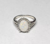 Sterling Silver Genuine 10mm x 8mm Oval Opal & Diamond Ring