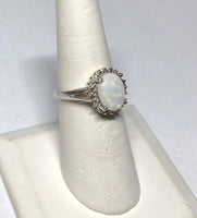 Sterling Silver Genuine 10mm x 8mm Oval Opal & Diamond Ring